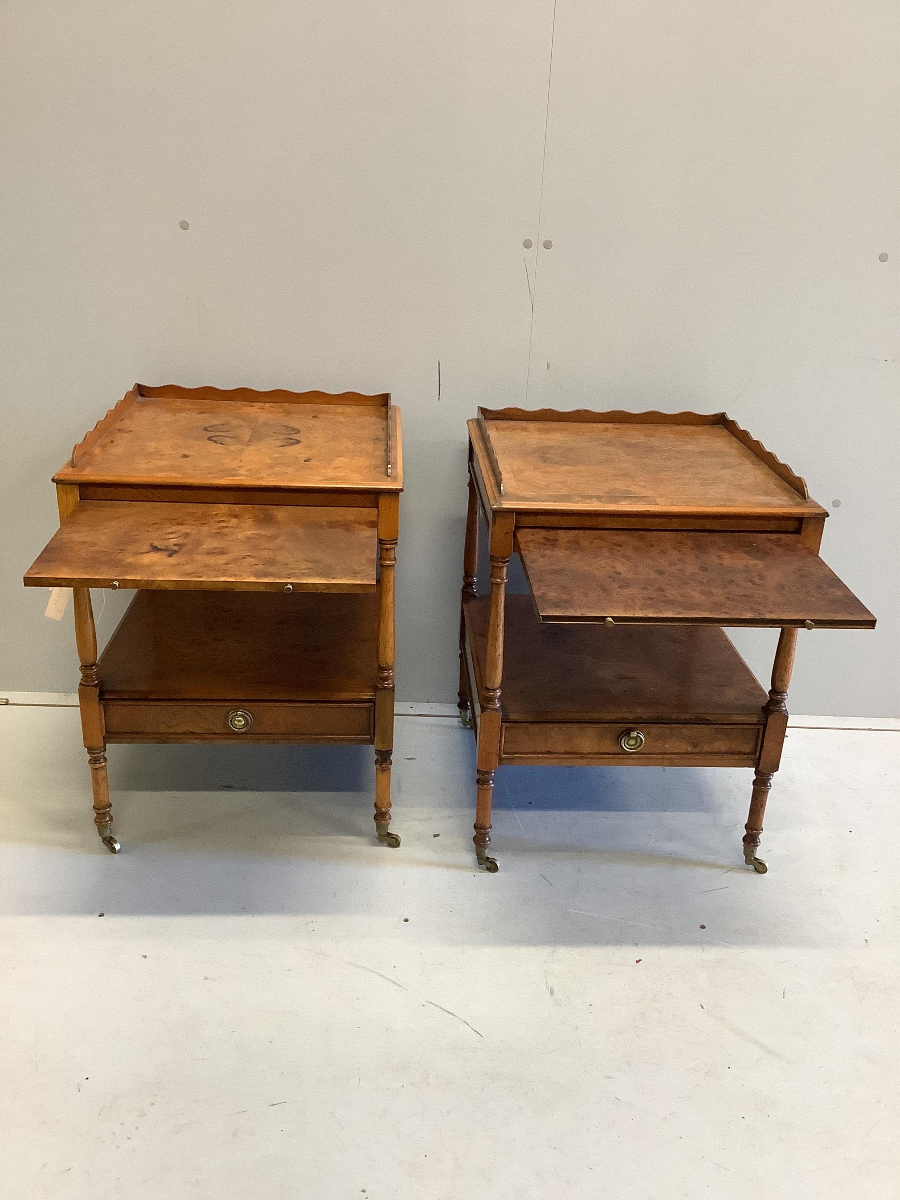 A pair of reproduction burr elm two tier bedside tables fitted slides, width 46cm, depth 46cm, height 64cm. Condition - fair, surfaces have worn areas.